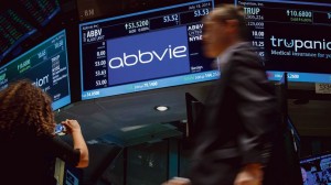 A screen displays the share price for pharmaceutical maker AbbVie on the floor of the New York Stock Exchange